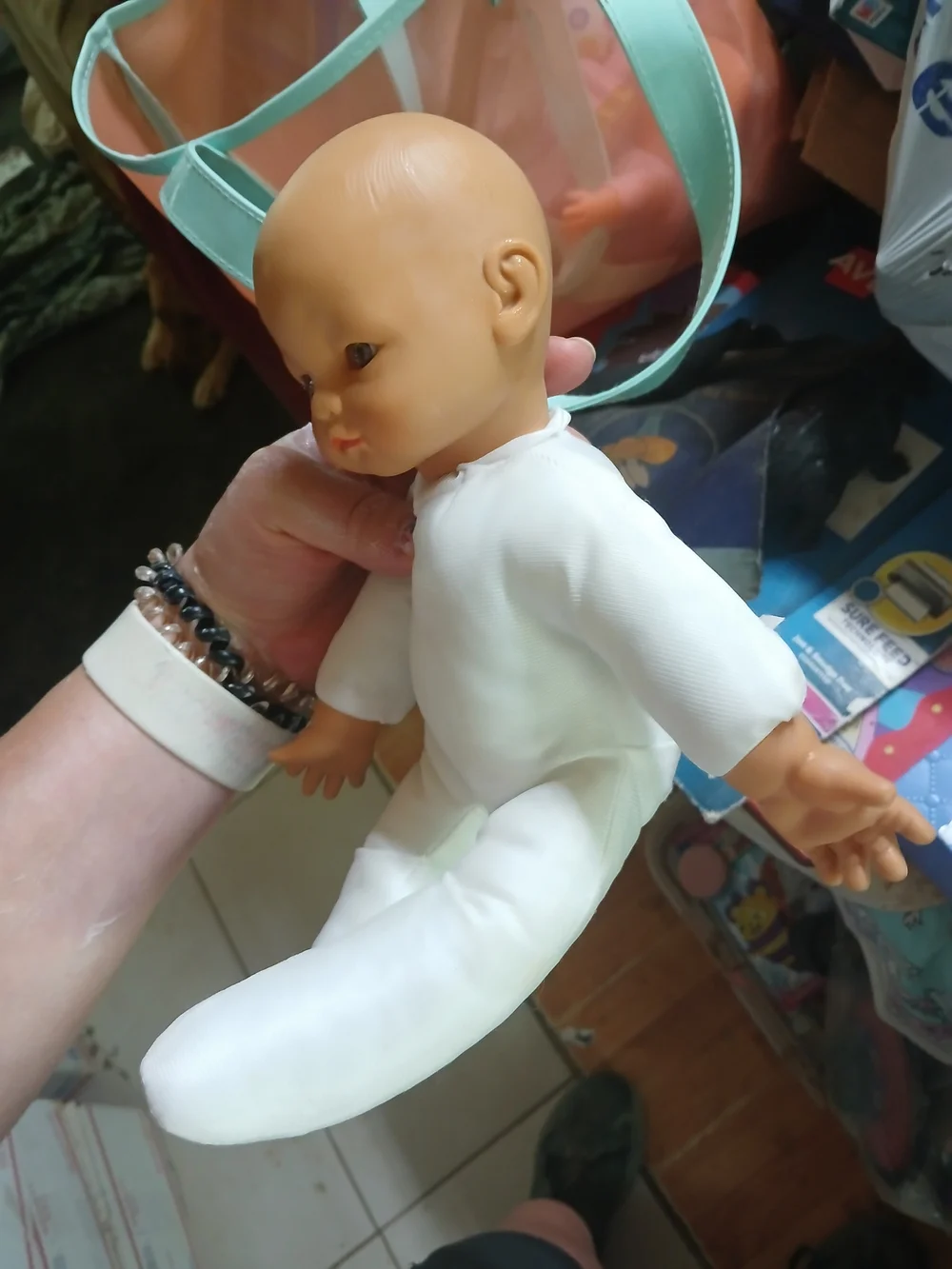 Uneeda baby doll with a soft cloth body and vinyl limbs